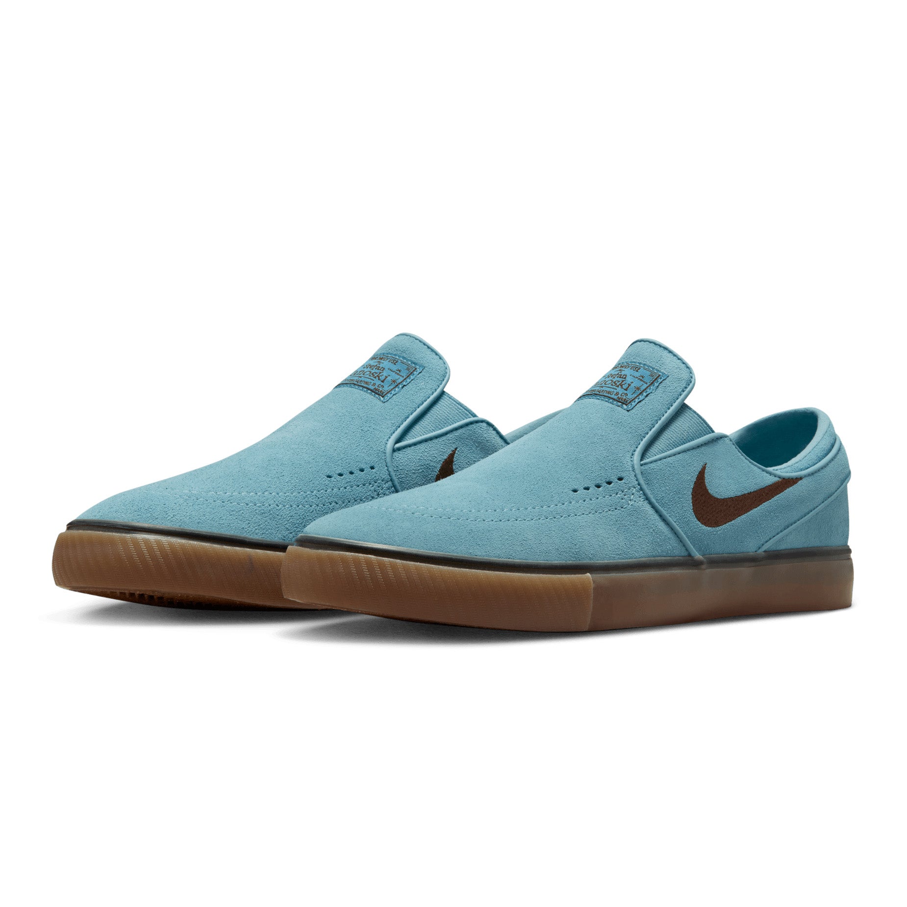 Turquoise Nike Sb Janoski Slip Pair