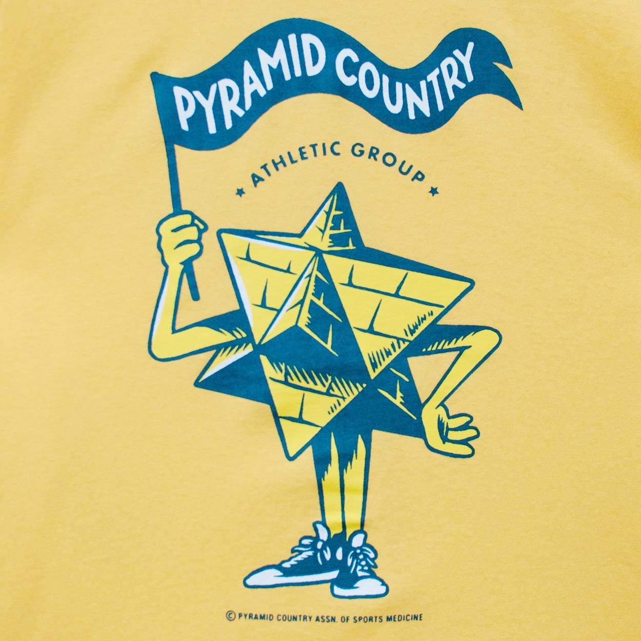 Pyramid Country Athletic Group Tee - Yellow